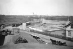 Vy mot Linköping från Tannefors sluss. Närmast till höger ses stadens vattenverk. Bilden har daterats till omkring 1895.