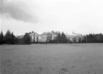 Växjö lasarett i kv. Värend, fotograferat från läroverkets skolgård, ca. 1910-tal.