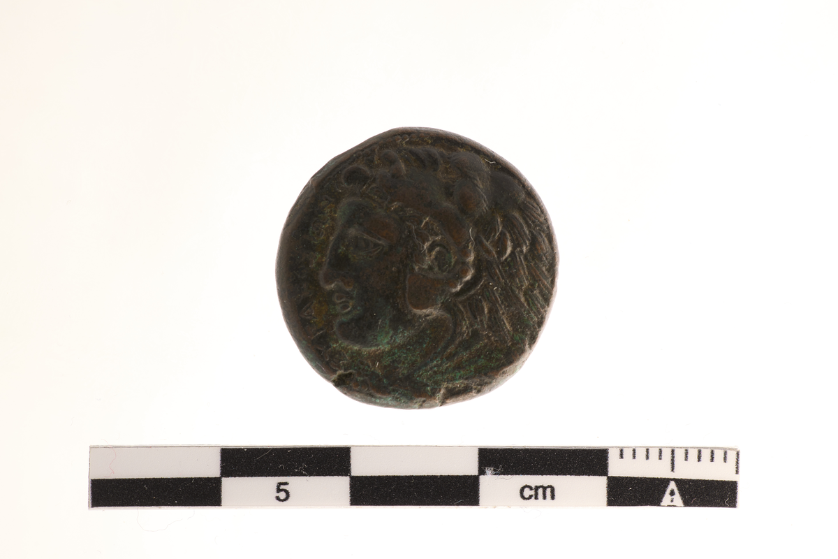 Motiv advers: Herakles med løveskinn

Motiv revers: Athene med sverd og skjold