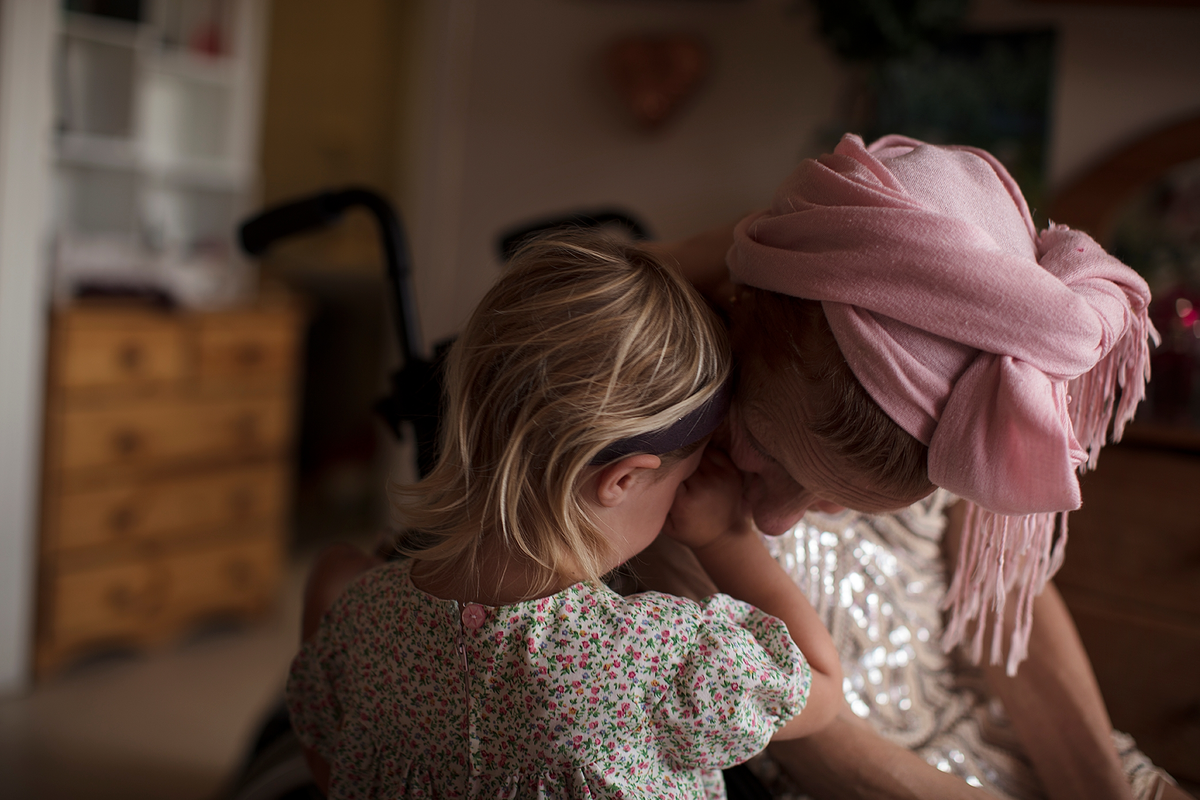 Then and In Between Now #Hugging grandaughter [C-type print]