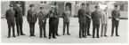 Besök av utländska försvarsattachéer, I 11 den 25/8 1970. 
Fr.h.: Kapten Tamm, FKE*, överste Lee, Sydkorea. överste Johnson, USA, överstelöjtnant Nordgren, Finland, major Igelstam, FKE, överstelöjtnant Hevia, Spanien, regchef I 11 överste Löfgren, överste Grandperret, Frankrike, defence attaché Wang, Folkrepubliken Kina, överstelöjtnant Raschen, Storbritannien, kapten Hegg, I11 samt major Andrae, I 11.

*Försvarsdepartementets kommandoexpedition