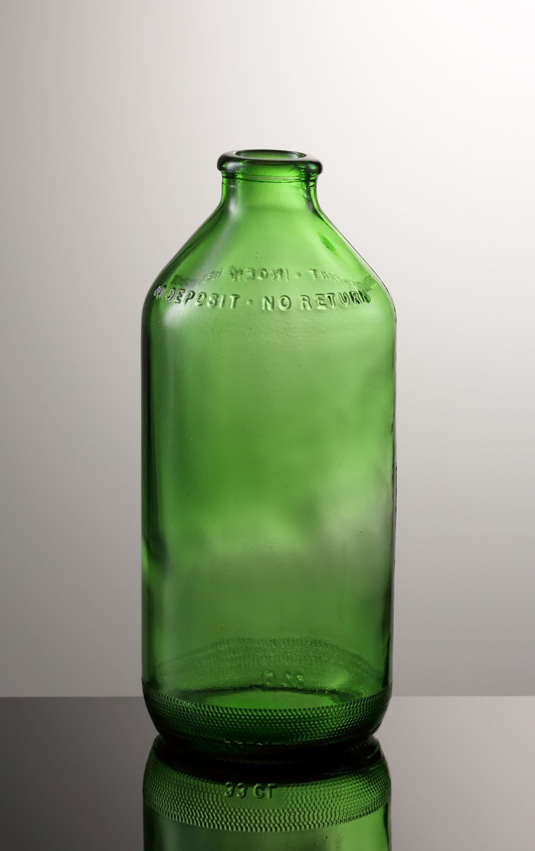 Flaska från Hammars glasbruk.
Maskintillverkad. 
Modell: PLM Hammars Glasbruk 330 ml. Stubber AB Plåtmanufaktur.
Grönfärgat klarglas.

Inskrivet i huvudkatalogen 1977.