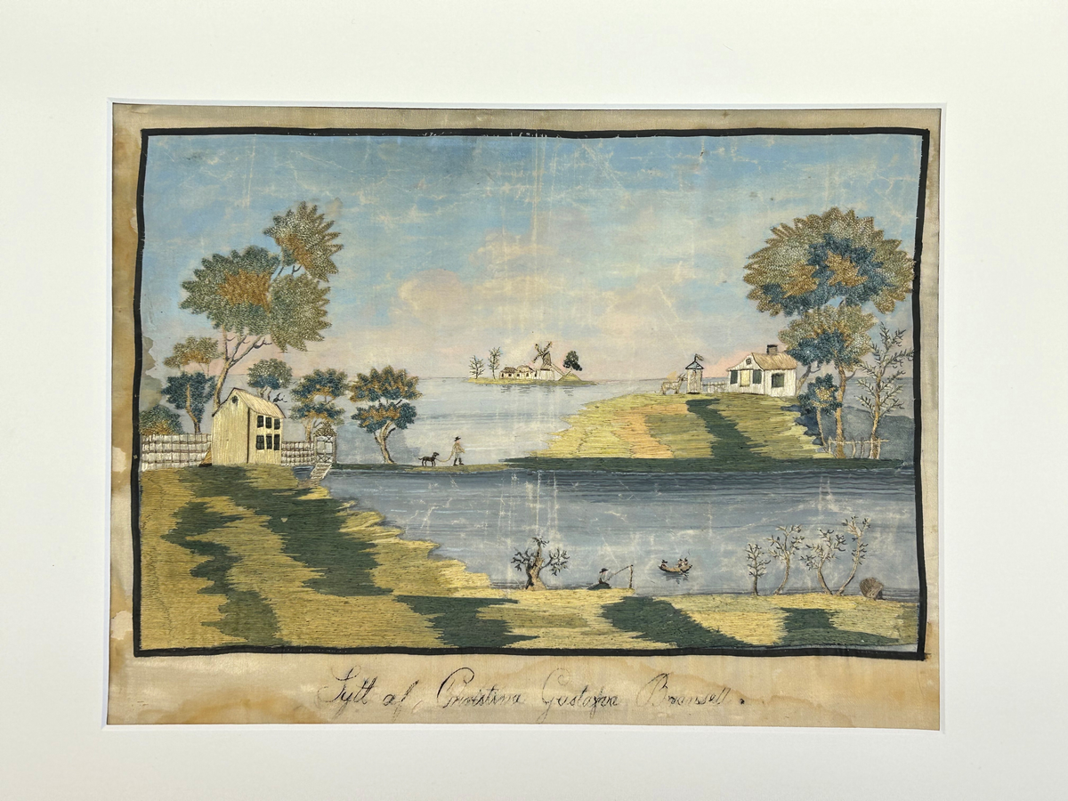 Landskapsmotiv föreställande en strand vid en sjö med till en viss del bebyggda öar.