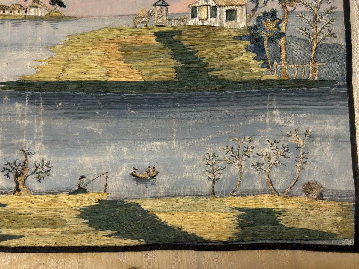 Landskapsmotiv föreställande en strand vid en sjö med till en viss del bebyggda öar.