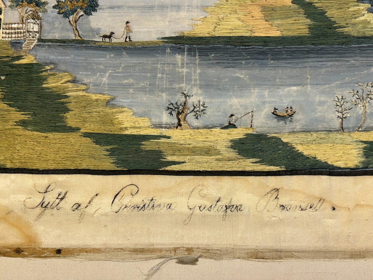 Landskapsmotiv föreställande en strand vid en sjö med till en viss del bebyggda öar.