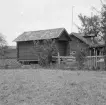 Borlänge, Trönö. Lindbligården gammalt härbre märkt 1891.