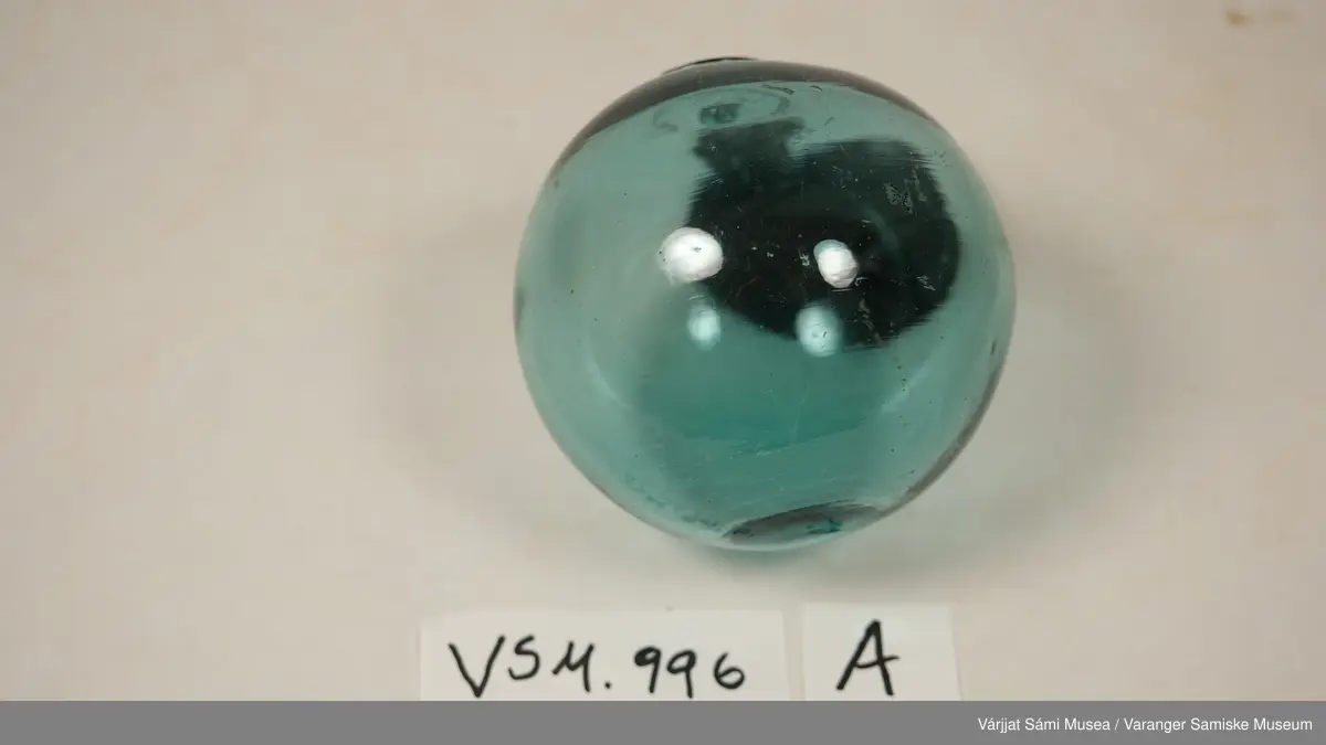 Sjøgrønn glassblåse.