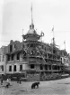 Feukska huset i hörnet Storgatan - Bäckgatan under uppbyggnad, 1908.