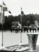 MM i militär femkamp. Kristianstad 1965.
Segrare: Claes Friberg I11.
Närbild på prisbordet med plaketter, bordsflaggor och en silverpokal.