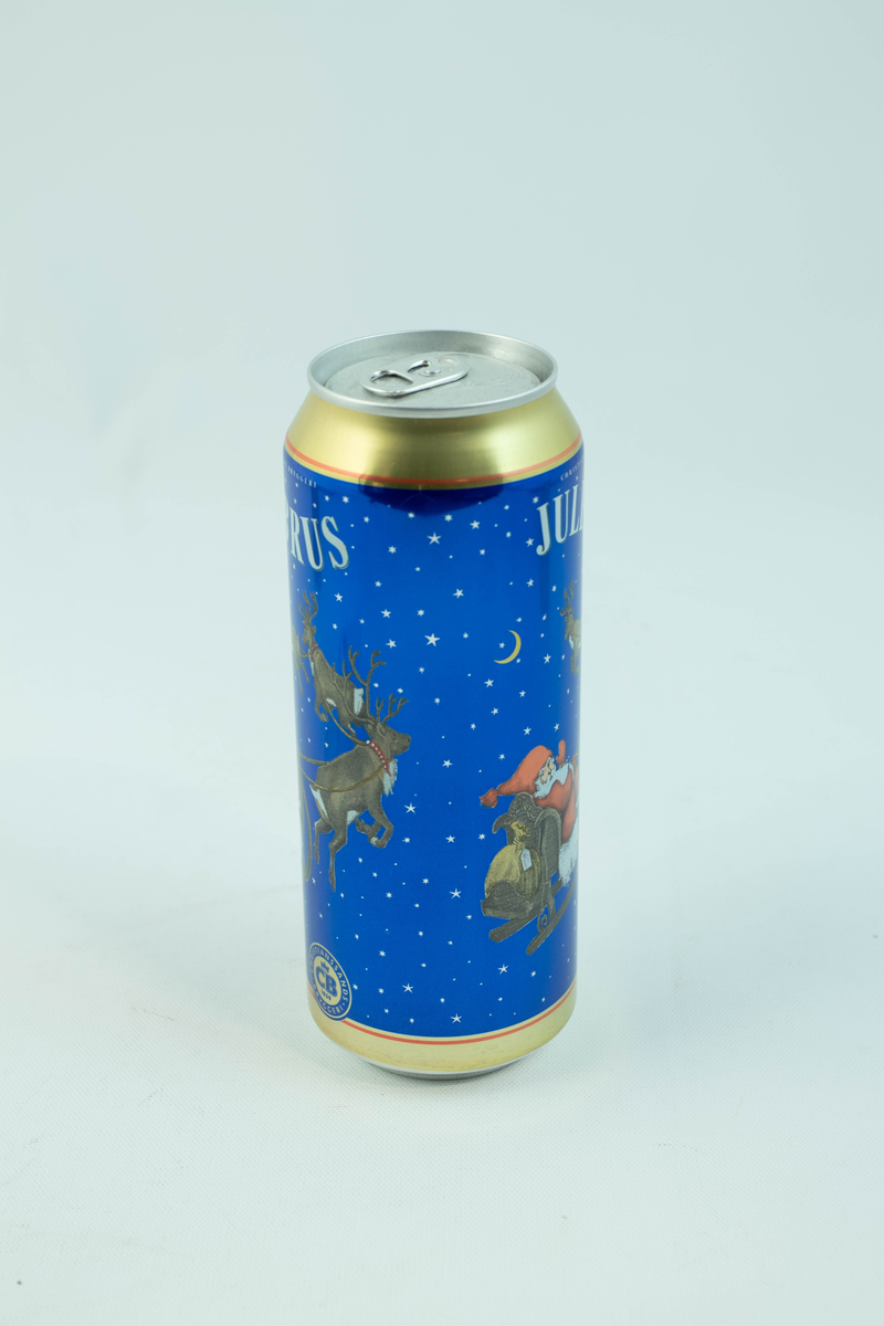 Blå aluminuimsboks som har flerfarget logo og julemotiv
