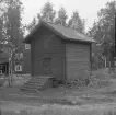 Borlänge, Torsång, Ornäs. Härbre 42 b över dörren. 1921-1926.