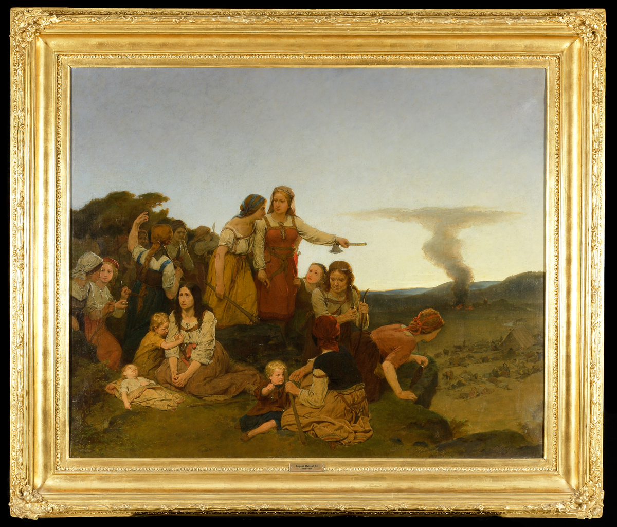 Oljemålning på duk. 
Föreställande kvinnor och barn på en höjd blickande ner över ett läger. 
I mitten av gruppen Blenda med en stridsyxa i vänstra handen. I bakgrunden till höger en brinnande by.