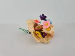 Majblommebukett med spetspapper