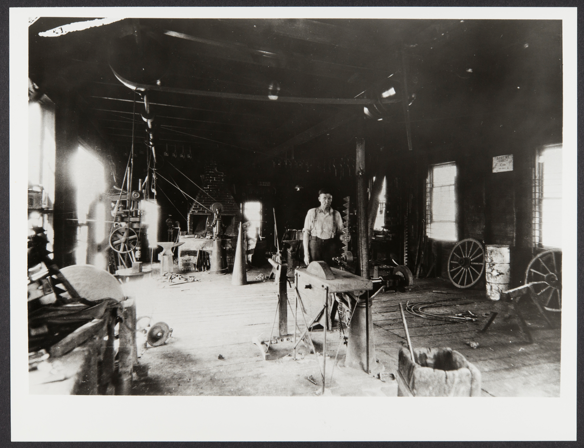 Blacksmith Harry Gunderson in New Richmond, Wisc. 1935.