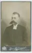 Porträtt på Regementspastor Johan Gustaf Emil Ydström född 21 november år 1861