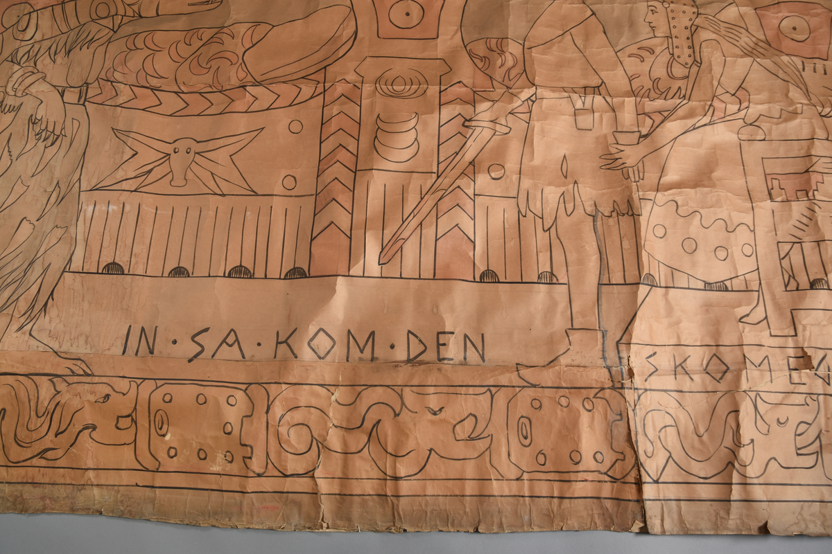 Motiv frå visa om Aasmund Frægdagjeva
Hovudmotiv: Trollskapning, kvinneskikkelse (Gygre) sterkt nuppete kropp. Nuppete grå kjole, mønster i skjørtekant. Grått hår. Cape med mønster fell nedetter ryggjen. To armringar. Klør og tryne som villgris. Mann med klede, høge sko, hjelm og sverd med flekkar i handa. Kvinne sit i ein stol/gøymer seg bak mannen, hun har kjole med dekorelement. Langt ljost hår og hjelm. Stolen har krosslignande dekor. Setet har detaljar. Bak dei er det to plassbygde senger som er oppreidd med dyne og pute. Dyna er kvit med detaljar, puten er berre kvit. Sengane er dekorerte med dekorelementer.
Sidemotiv: til venstre eit loddrett felt med svart tekst øvst. Ei dør med svart jarn midt i sidefeltet. 
Oppe:  vannrett bord med  5 dragar og eit vikingskip. 
Nede: vannrett bord - kan også tolkast som gulv i motivet med skrift. Sokkel under stolen med svart skrift på sida, kvit oppå. 
Heilt nedst på teppet er det ein vannrett bord med dekor av ormar og noko som kan tolkast som beslag/låser.