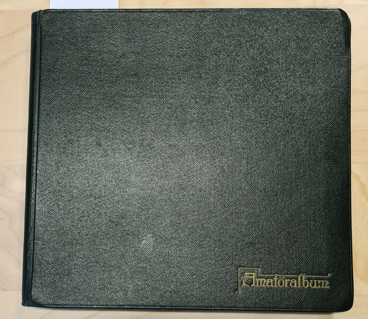 Album, mörkgrönt ca 22 x 25 cm