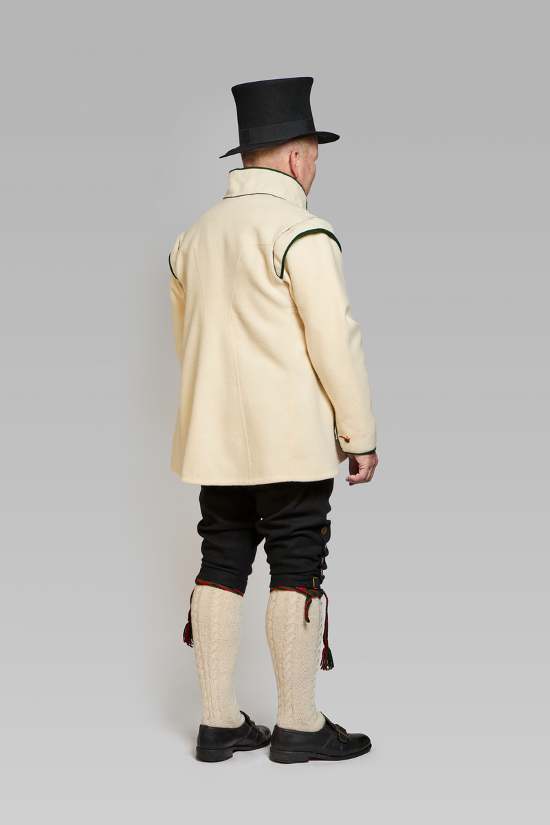 Steglatrøye for Øvre Valdres, 1810-1830. Her med vadmelsknebukser og flosshatt.