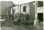 Västerås, Centrum, kv. Klas.
Rivningshus vid Smedjegatan. 1929-1930.