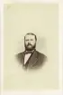 Porträtt av en man, möjligen riksdagsman, bröstbild. Autograf på bildens baksida.
