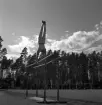 Medborgartåget, 16/6 1940. 
Gymnastikuppvisning av manlig gymnast på Värendsvallen.
I bakgrunden syns en fanborg.