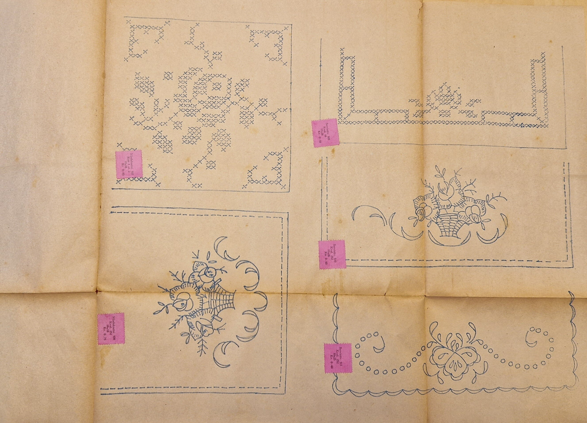 Varukatalog med broderimönster. Innehåller c:a 130 mönster + två "bokmärken." Svart pärm, mycket skadad. 