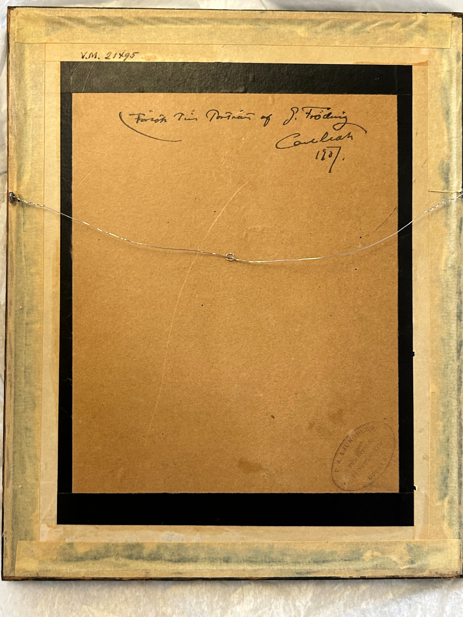 Foto av Gustaf Frödings byst 1907, monterat inom glas och ebenholtzram.