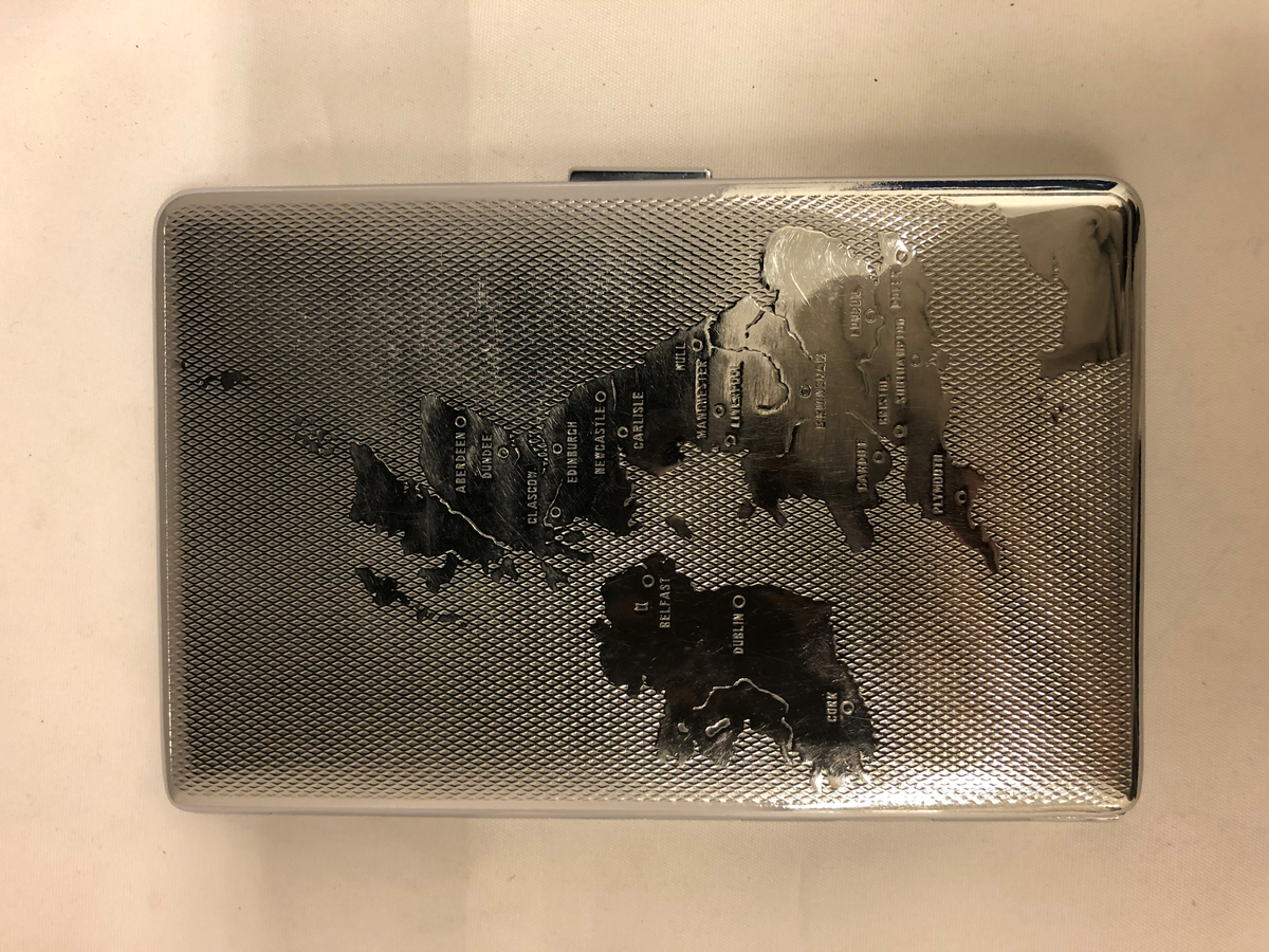 Storbritannien med Irland präglad på locket inklusive viktiga städer
