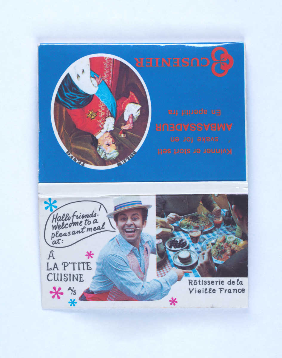 Reklamemateriell for restauranten La P'tite Cuisine i form av en liten fyrstikkmappe. Det er fremdeles 13 fyrstikker igjen i mappen.