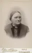 Porträtt av prostinnan Hallgren f. Vidmark (enligt text baksida kort).