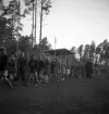 Svenska Flaggans dag, 6/6 1941. 
Inmarsch med skolbarn på Värendsvallen.