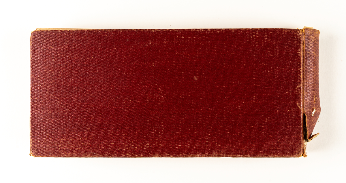 Fotoalbum innehållande bilder från spårvägens anläggande i Gävle 1909. Röda pärmar med påskrigt i guld "Fotografier". Inskrift på insidan av pärmen "H. Hedberg Gefle 1909". Ryggen trasig.
