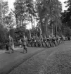 Svenska Flaggans dag 1943. 
En trupp från  I 11 tågar in på Värendsvallen.