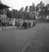Svenska Flaggans dag 1943. 
Intåg på Värendsvallen, förbi hedersläktaren.