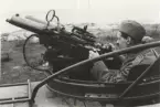 Skytt med 8 mm kulspruta m/1936 .