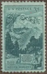 Frimärke med motiv av nationalmonumentet Mount Rushmore i Sy