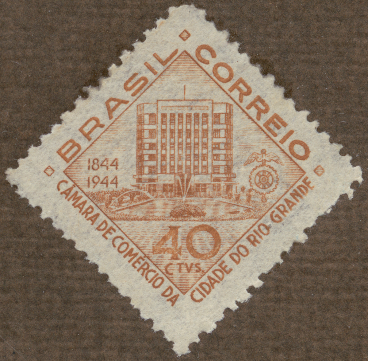 Frimärke ur Gösta Bodmans filatelistiska motivsamling, påbörjad 1950.
Frimärke från Brasilien, 1944. Motiv av Kommers Kollegiii byggnad i Rio Grande 100-års minne 1844-1944.