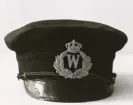 Polismössa för poliskonstapel, med mössmärke i form av W (Wexiö) under krona, ca 1920-25.