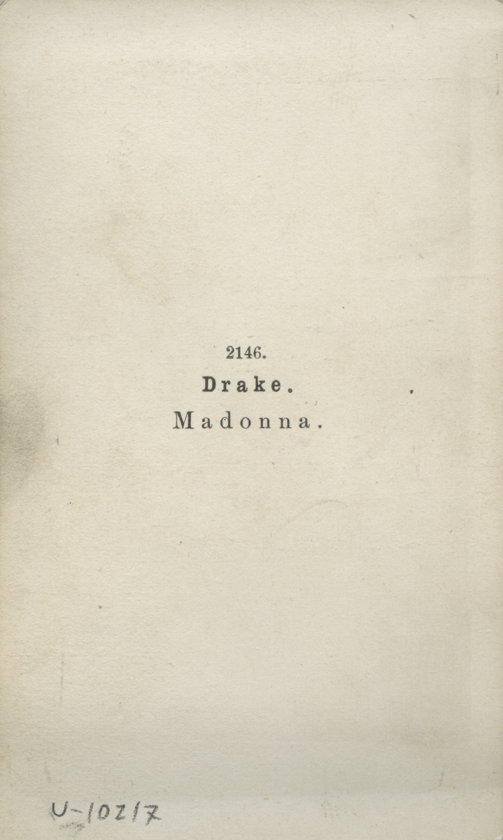 Bild av madonna med barn i vitt. Text baksida kort: 2146 Drake Madonna.
