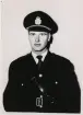 Poliskonstapel Bengt Lago, Växjö, 1955. 
Midjebild, en face. Ateljéfoto.