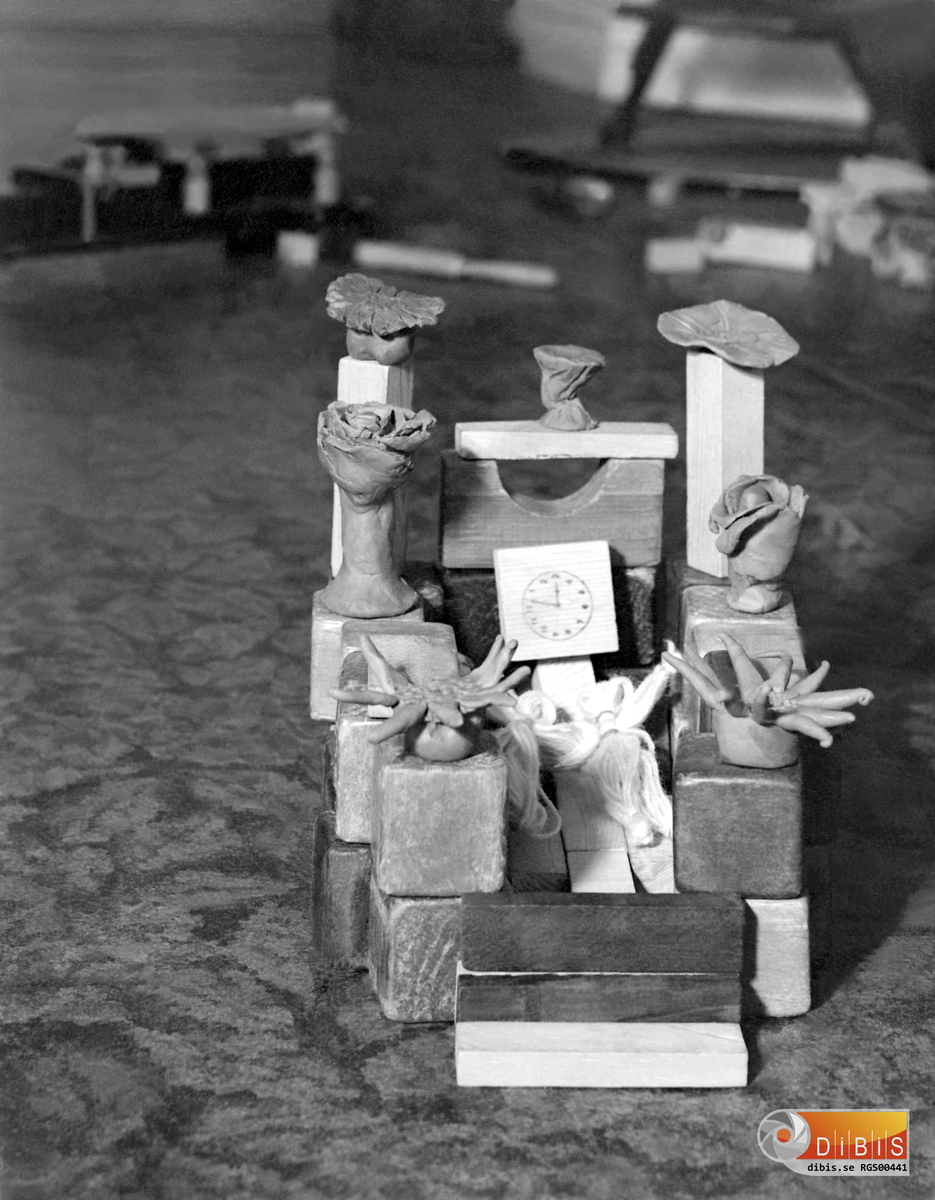 Lergubbar 1945, 8. Blomfigurer.