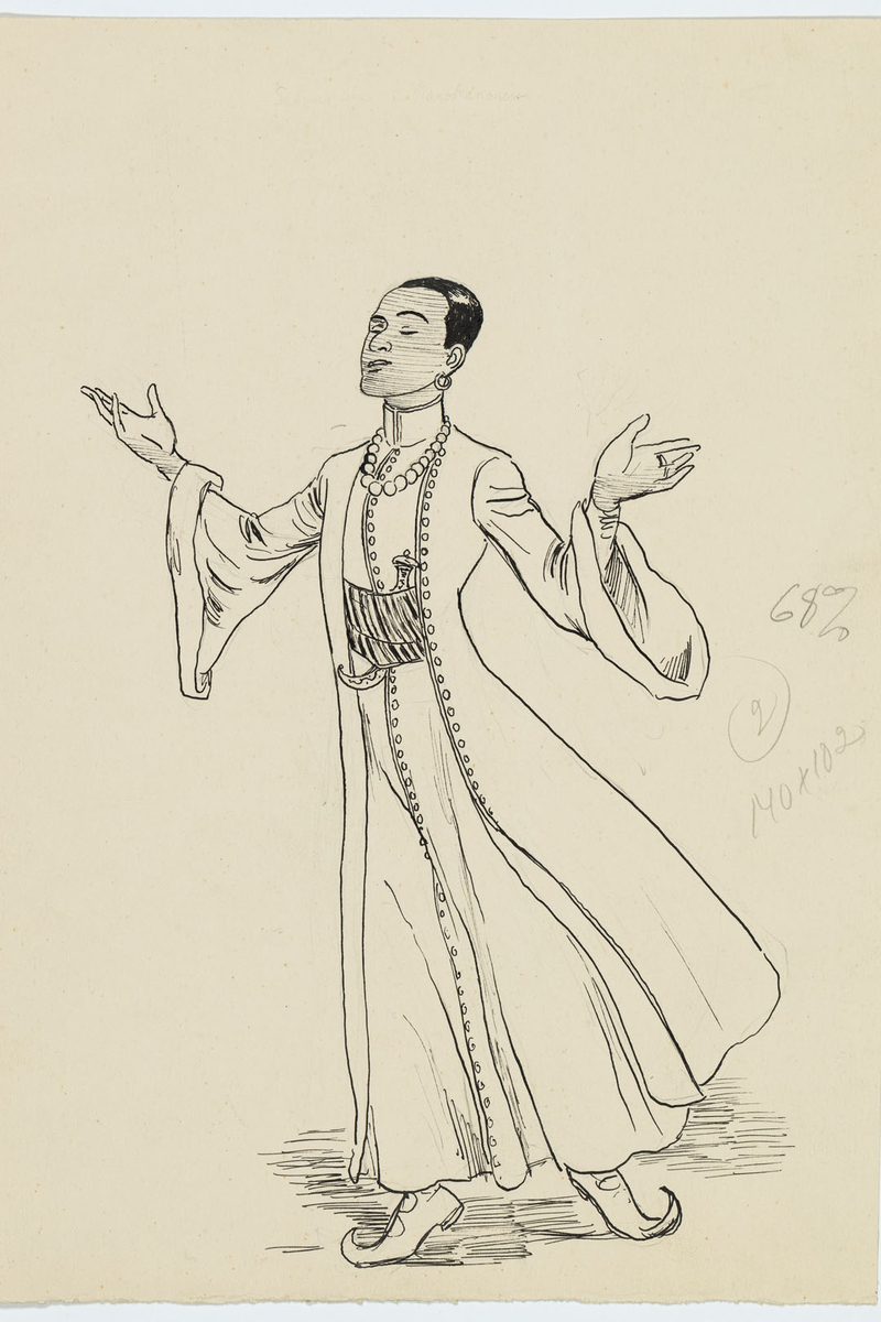 Mörkhyad man i lång kaftan med brett skärp om midjan med en dolk innanför. Snabelskor på fötterna.
