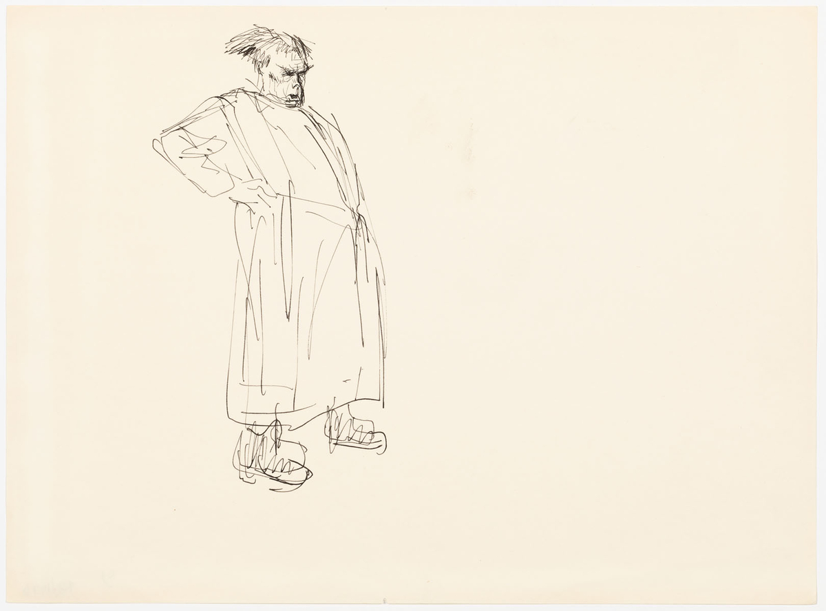 Man i helfigur ståendes vänd mot höger. Mannen är iklädd ankellång dräkt och stövlar samt håller sin högra hand mot höften. Mannen har kort rakt hår. 
