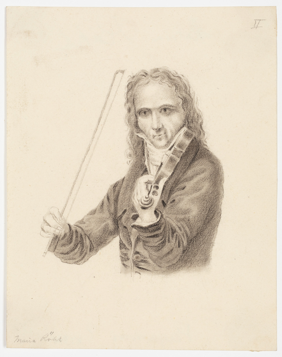 En man med långt hår pch med svart kavaj spelande en violin. 
