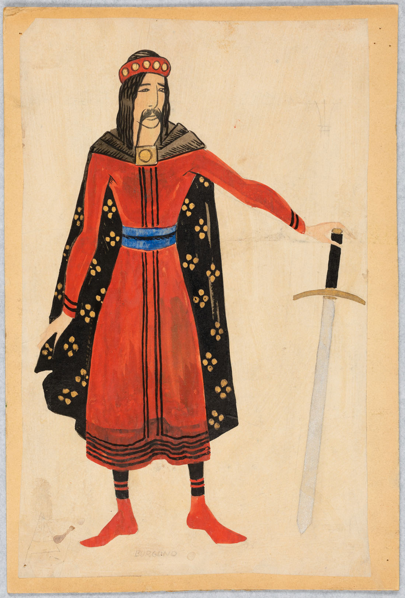 Man med hängande mustascher, röd halvlång tunika med svarta band och blått bälte över svarta och röda hosor, svart mantel med rutformat ordnade prickar i guld. I sin vänstra hand håller han ett långt svärd med handtag i svart och guld.
