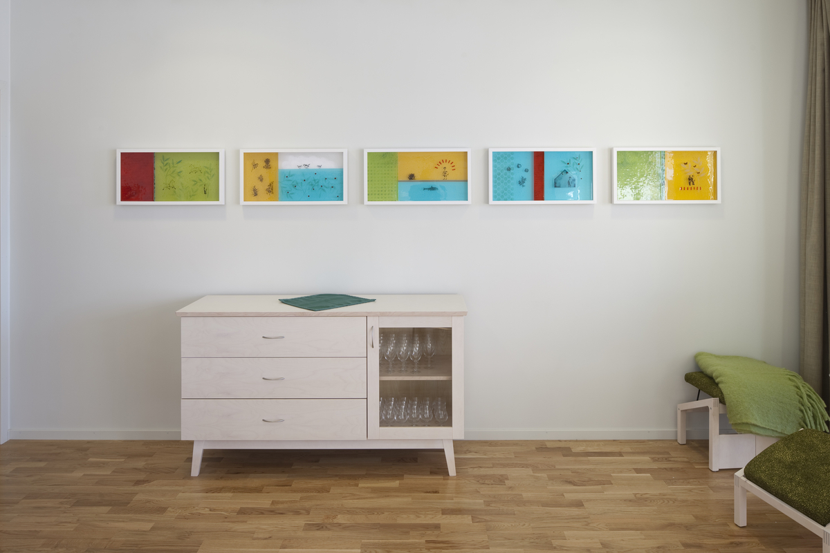 Glassbilder montert i rammer