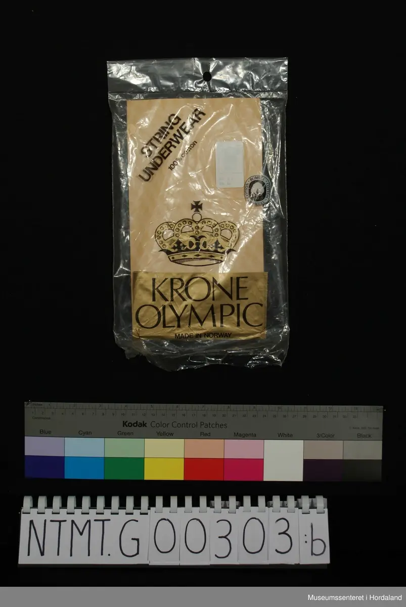 Korte ermer, rund hals, nettingstoff.