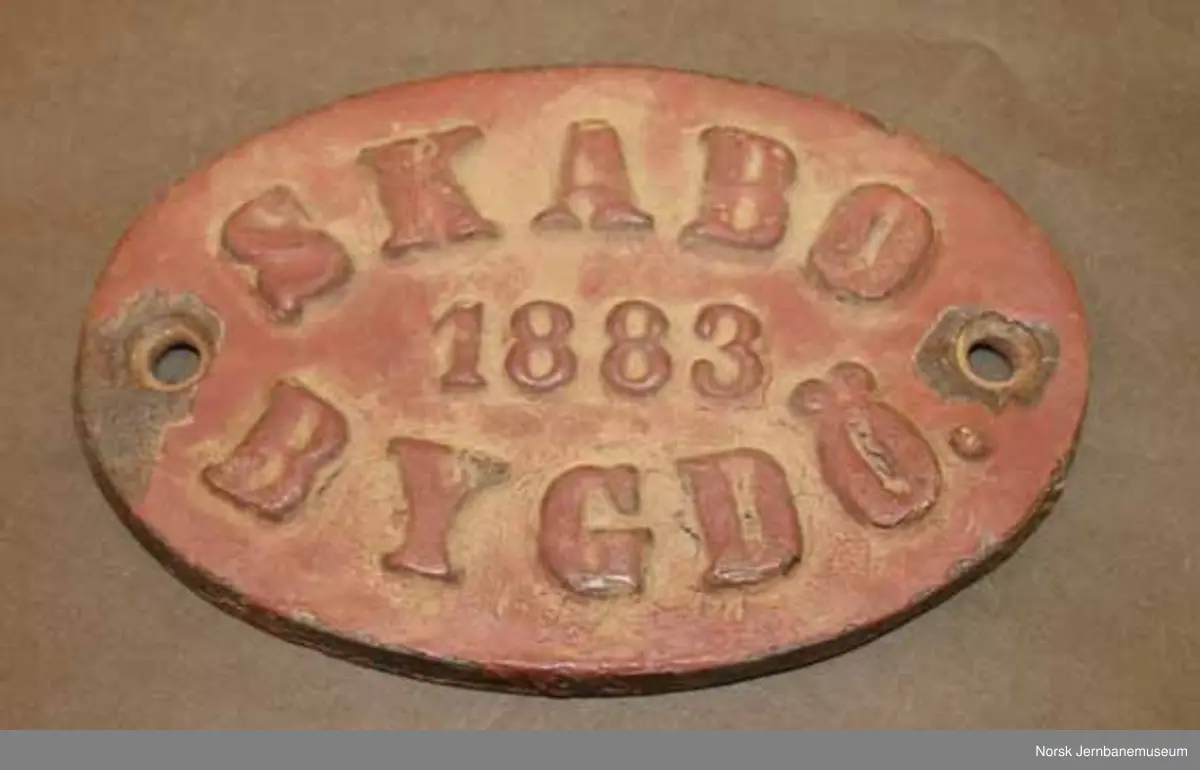 Fabrikkskilt fra Skabo jernbanevognfabrik