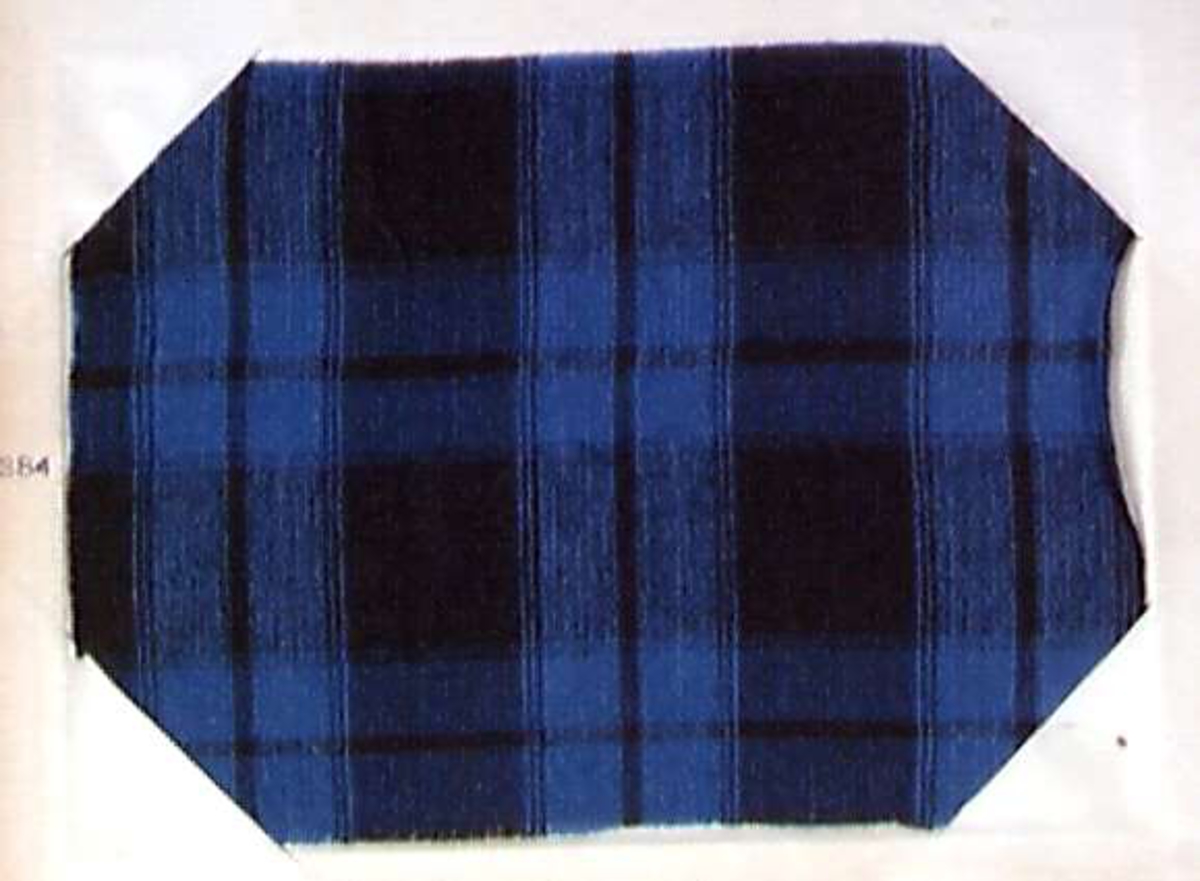 Bok med prøver på møbelstoff