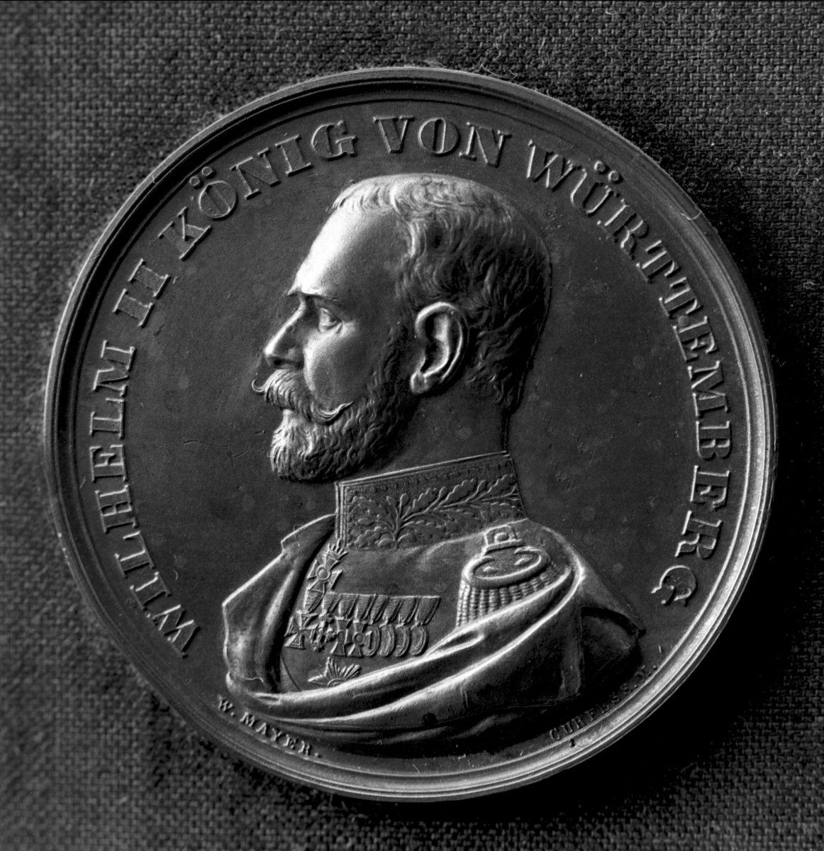 Medalje fra bake og kokeutstilling i Stuttgart i 1894.
Kong Wilhelm II av Württenberg